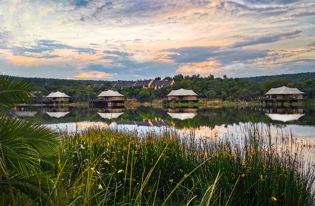 The safari suites across the water at sunset